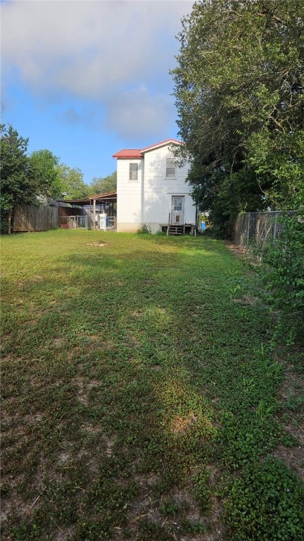 view of yard featuring fence