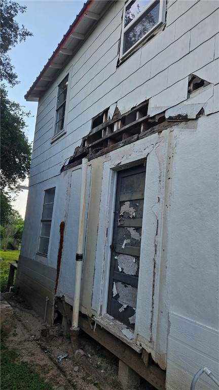 view of home's exterior featuring metal roof