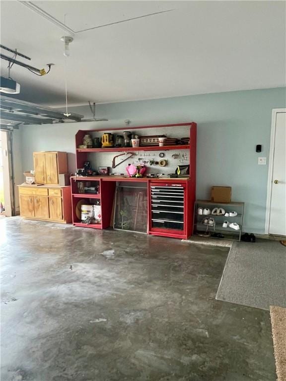 2237 Sunset Cliff Dr, Ingleside, TX 78362 - garage with a garage door opener and a workshop area