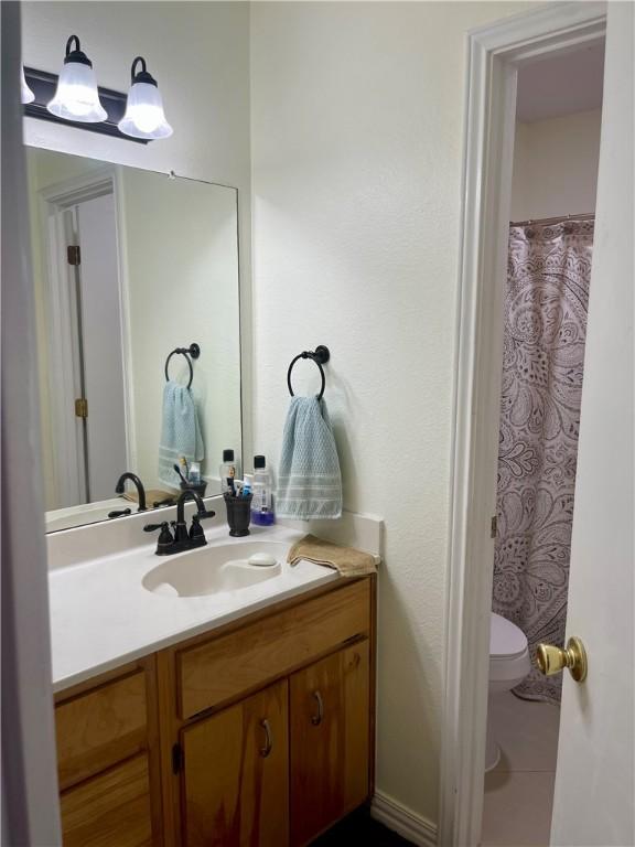 2237 Sunset Cliff Dr, Ingleside, TX 78362 - bathroom with toilet and vanity