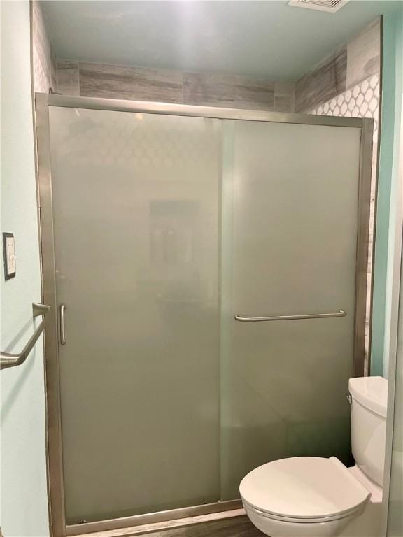 2237 Sunset Cliff Dr, Ingleside, TX 78362 - full bathroom with toilet and a stall shower