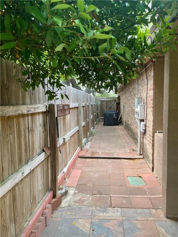 2237 Sunset Cliff Dr, Ingleside, TX 78362 - fenced backyard featuring a patio