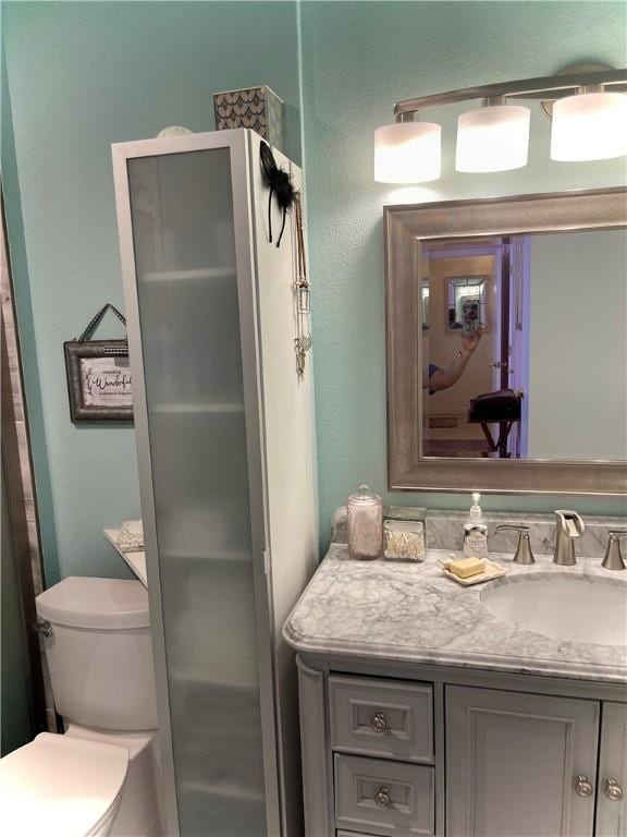 2237 Sunset Cliff Dr, Ingleside, TX 78362 - bathroom with vanity and toilet