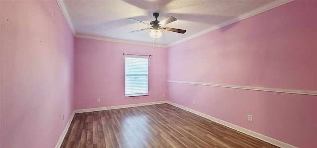 spare room featuring hardwood / wood-style floors, ceiling fan, ornamental molding, and a textured ceiling