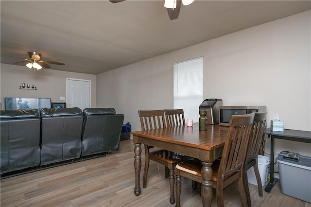 504 E Sarah St, Beeville, TX 78102 - dining space featuring ceiling fan and light wood-type flooring