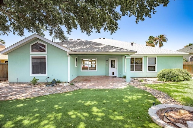 15658 Cumana Dr, Corpus Christi, TX 78418 - ranch-style home with a patio, stucco siding, and a shingled roof