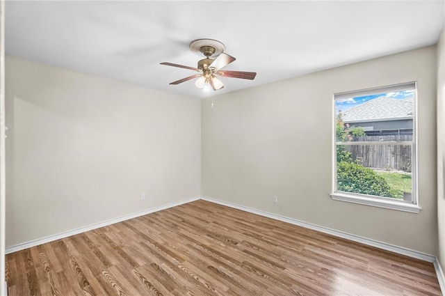 15658 Cumana Dr, Corpus Christi, TX 78418 - empty room featuring wood finished floors and a ceiling fan
