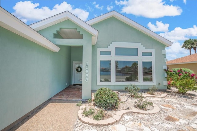 15658 Cumana Dr, Corpus Christi, TX 78418 - property entrance with stucco siding