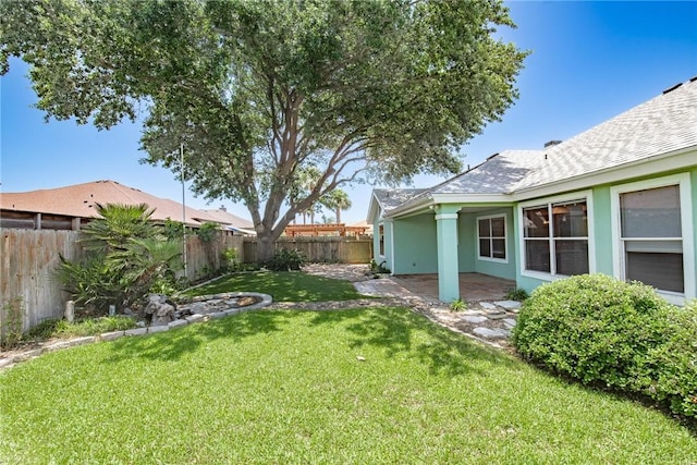 15658 Cumana Dr, Corpus Christi, TX 78418 - fenced backyard with a patio