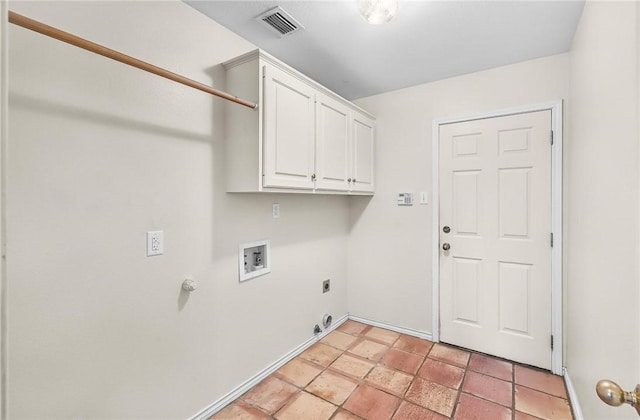15658 Cumana Dr, Corpus Christi, TX 78418 - laundry area with washer hookup, cabinet space, gas dryer hookup, and hookup for an electric dryer
