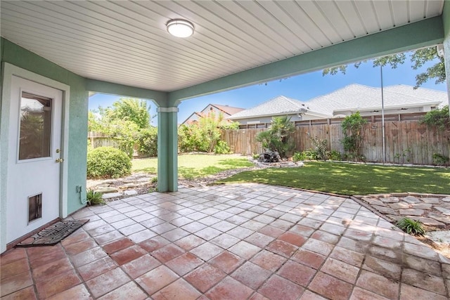 15658 Cumana Dr, Corpus Christi, TX 78418 - fenced backyard with a patio area