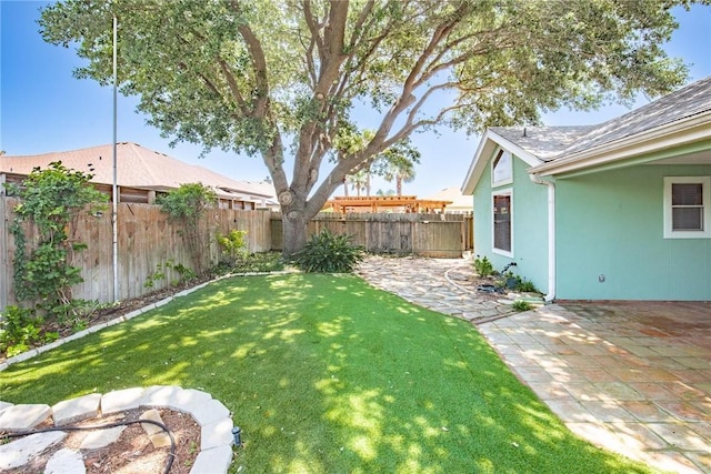15658 Cumana Dr, Corpus Christi, TX 78418 - fenced backyard featuring a patio