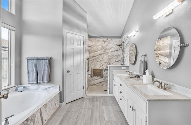 15658 Cumana Dr, Corpus Christi, TX 78418 - full bath featuring a shower stall, a bath, double vanity, and lofted ceiling