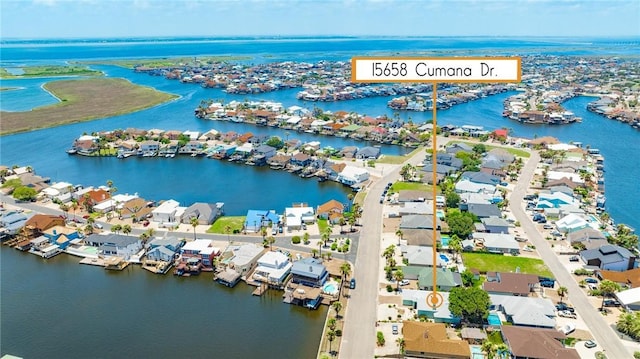 15658 Cumana Dr, Corpus Christi, TX 78418 - aerial perspective of suburban area featuring a nearby body of water