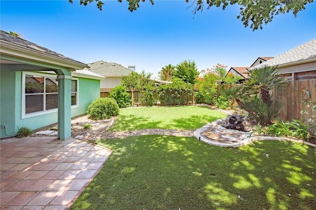 15658 Cumana Dr, Corpus Christi, TX 78418 - fenced backyard with a patio
