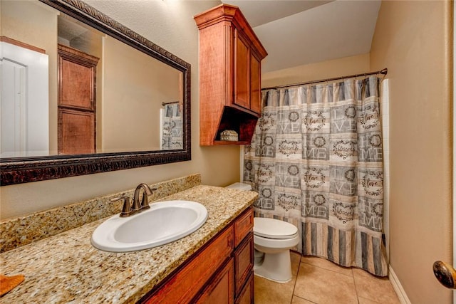 bathroom featuring curtained shower, toilet, vanity, and tile patterned flooring