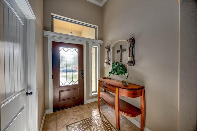 foyer with light tile patterned flooring