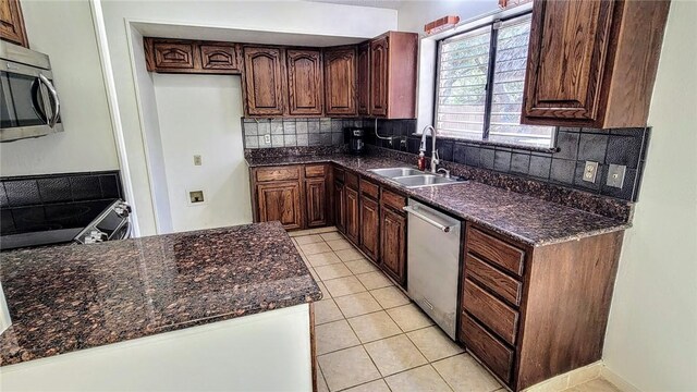 bathroom featuring tile patterned floors, shower / tub combo, and toilet