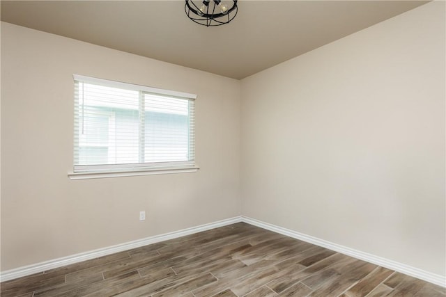 6766 Mikayla St, Corpus Christi, TX 78413 - unfurnished room featuring wood finished floors and baseboards
