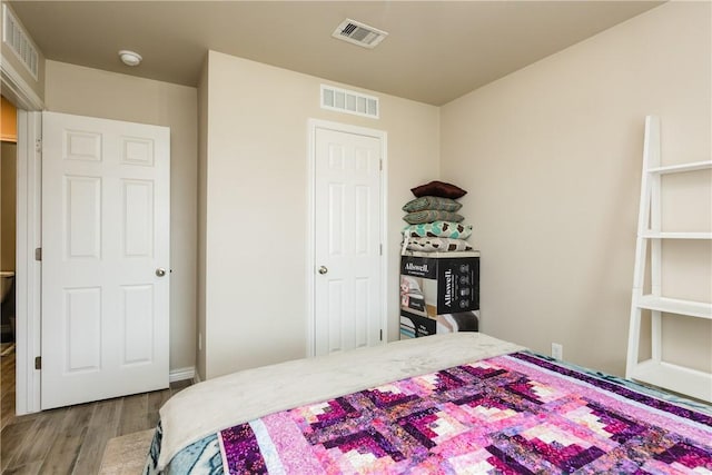 6766 Mikayla St, Corpus Christi, TX 78413 - bedroom featuring wood finished floors