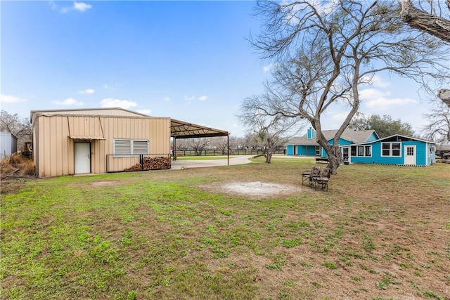 view of yard with a carport