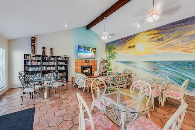 dining space featuring a fireplace