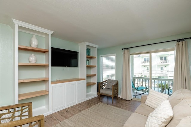 14802 Windward Dr Unit 233, Corpus Christi, TX 78418 - living area with light wood finished floors