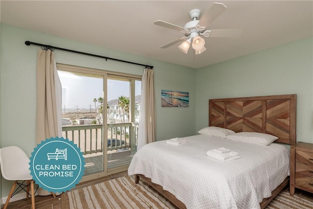 bedroom featuring access to outside, wood finished floors, and ceiling fan