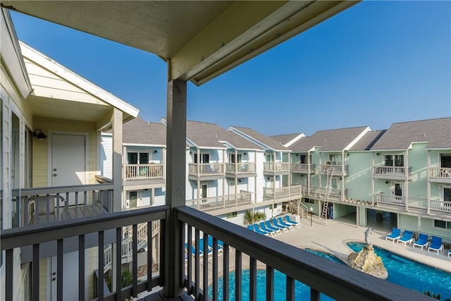 balcony featuring a residential view