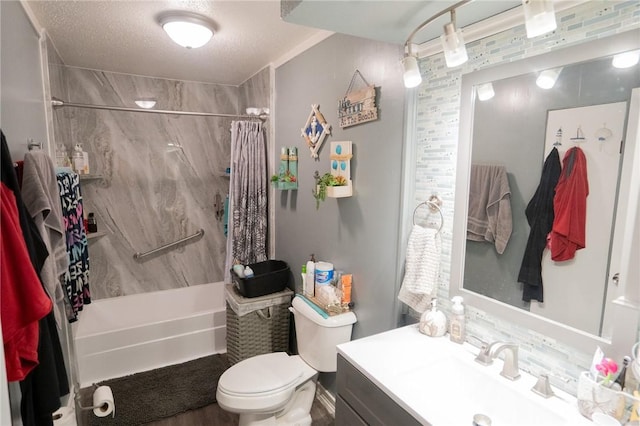 full bathroom featuring vanity, a textured ceiling, shower / tub combo with curtain, hardwood / wood-style flooring, and toilet