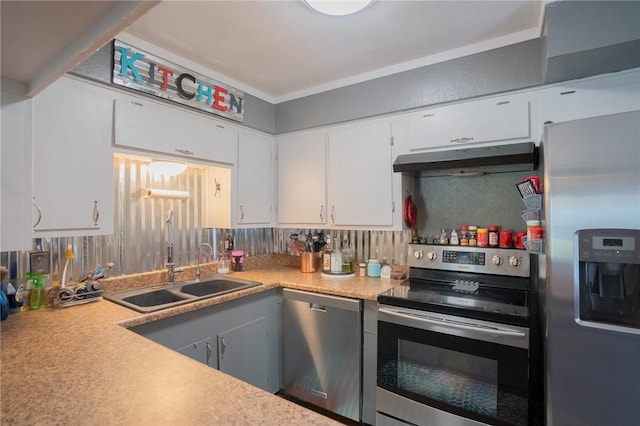 kitchen with white cabinetry, sink, and stainless steel appliances