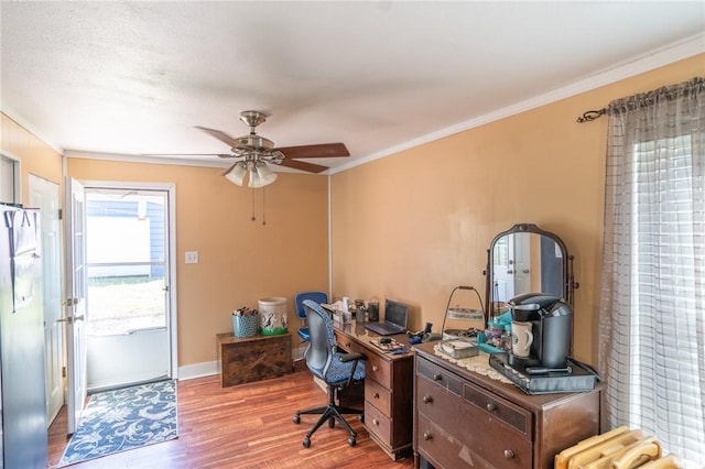 office space with hardwood / wood-style floors, a textured ceiling, ceiling fan, and ornamental molding