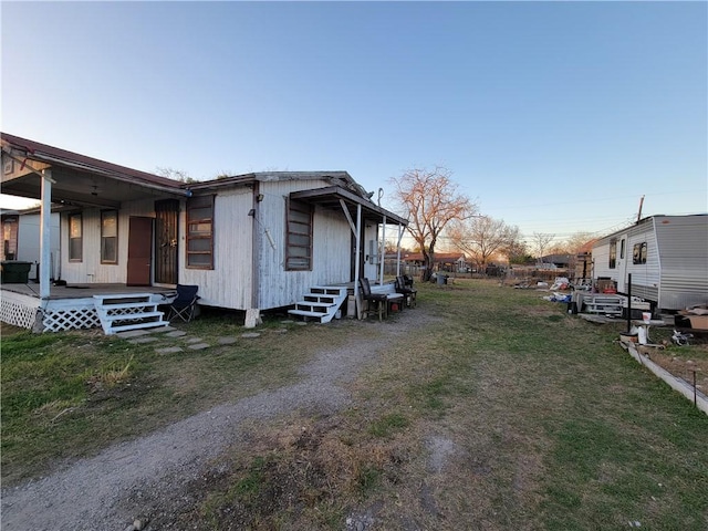 view of property exterior featuring a yard