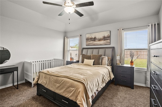 2689 Everly Ln, Corpus Christi, TX 78415 - bedroom with dark carpet, baseboards, and ceiling fan