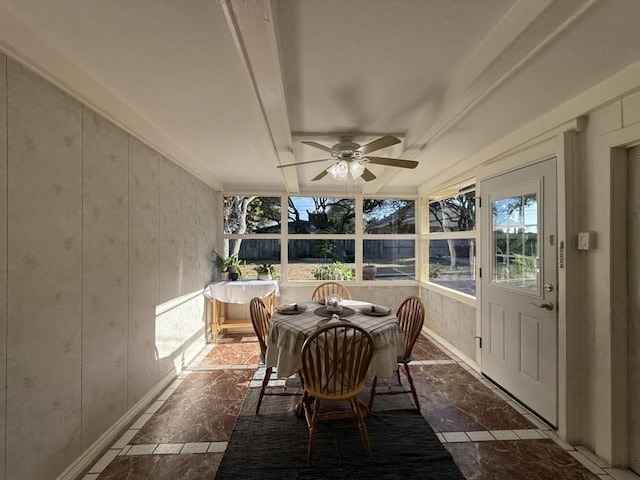 sunroom with ceiling fan