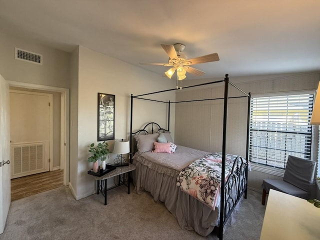 carpeted bedroom featuring ceiling fan