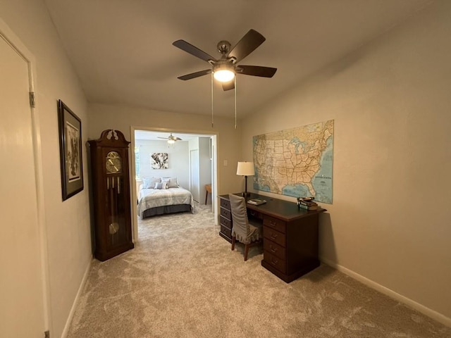 carpeted bedroom with lofted ceiling and ceiling fan