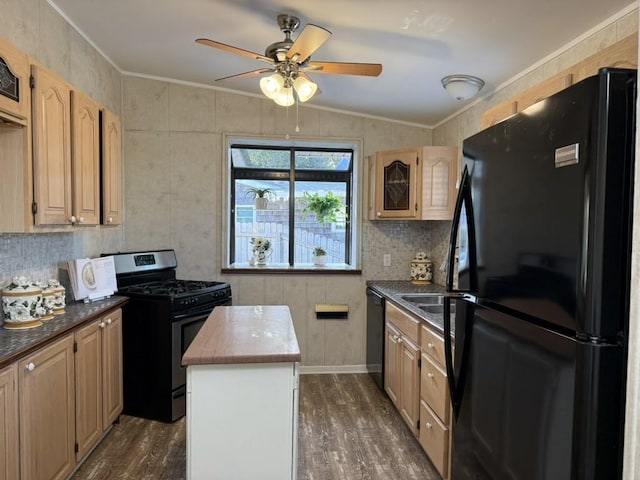 kitchen featuring a center island, lofted ceiling, light brown cabinetry, dark hardwood / wood-style floors, and black appliances