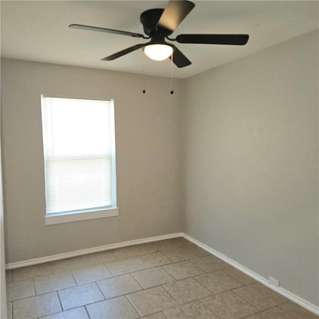 4749 Mokry Dr, Corpus Christi, TX 78415 - unfurnished room featuring light tile patterned flooring and a ceiling fan