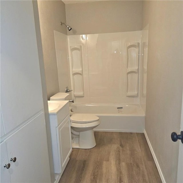 4749 Mokry Dr, Corpus Christi, TX 78415 - full bathroom with wood finished floors, vanity, and shower / bath combination