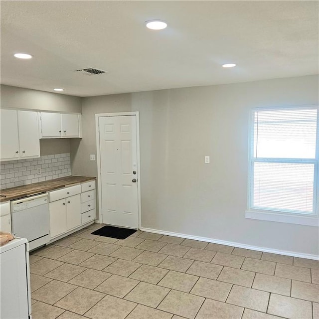 4749 Mokry Dr, Corpus Christi, TX 78415 - kitchen with dishwasher, tasteful backsplash, white cabinetry, and recessed lighting