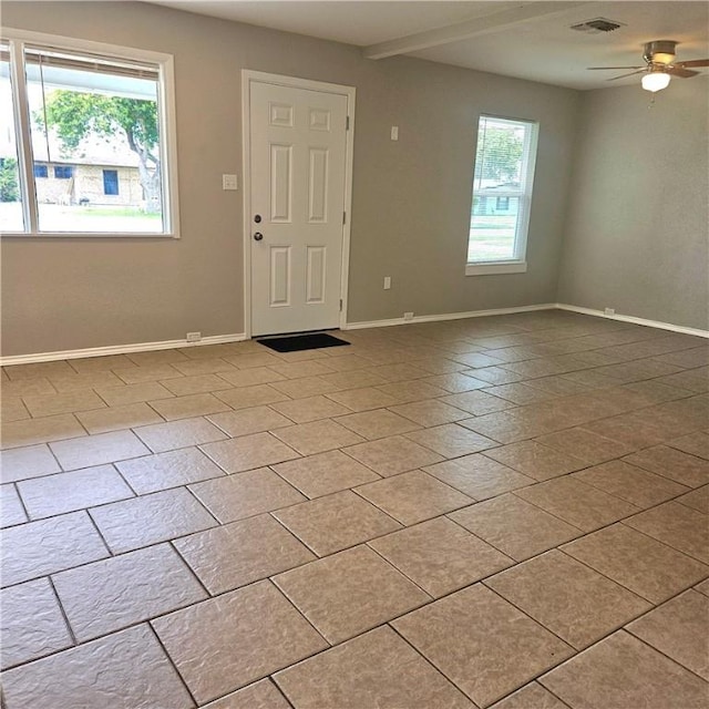 4749 Mokry Dr, Corpus Christi, TX 78415 - tiled empty room with baseboards and a ceiling fan