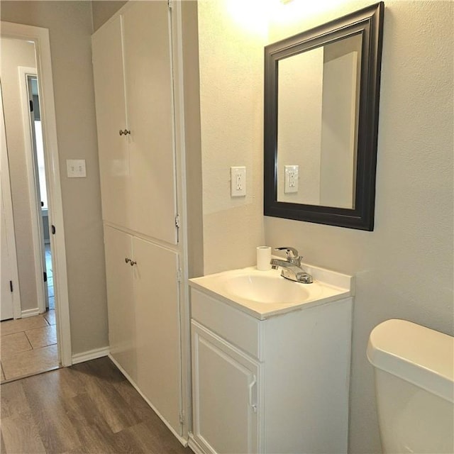 4749 Mokry Dr, Corpus Christi, TX 78415 - half bath featuring vanity and wood finished floors