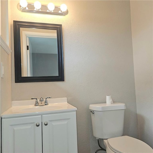 4749 Mokry Dr, Corpus Christi, TX 78415 - half bathroom with toilet and vanity