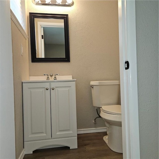4749 Mokry Dr, Corpus Christi, TX 78415 - half bathroom featuring vanity and wood finished floors