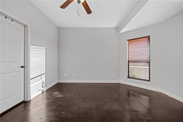 spare room with ceiling fan