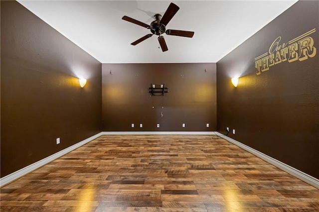 unfurnished room featuring hardwood / wood-style flooring and ceiling fan