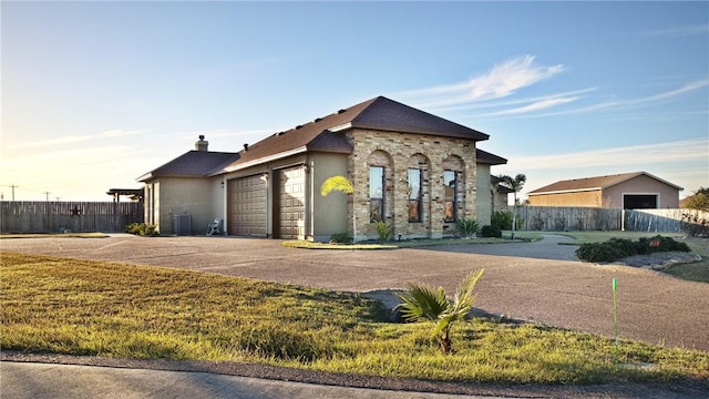 view of front of property with a garage