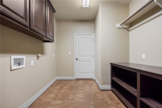 laundry area with cabinets and washer hookup