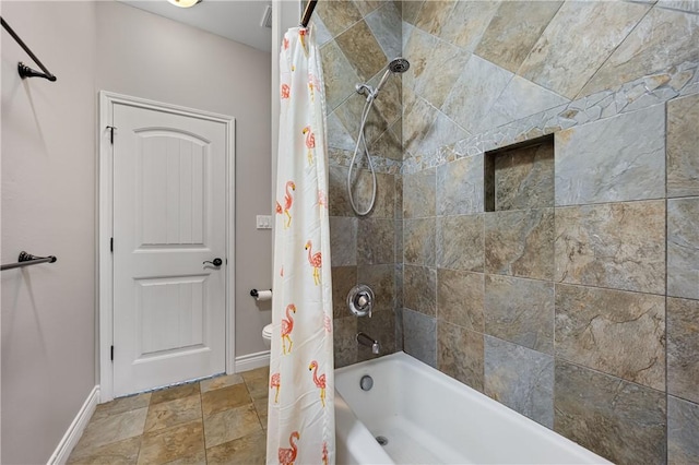 bathroom featuring shower / tub combo with curtain